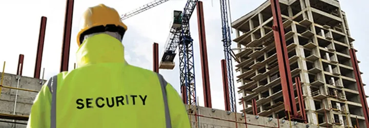 Security officer overlooking a construction site