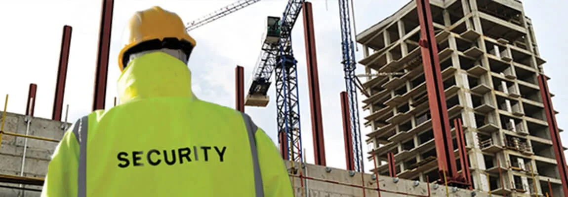Security officer overlooking a construction site
