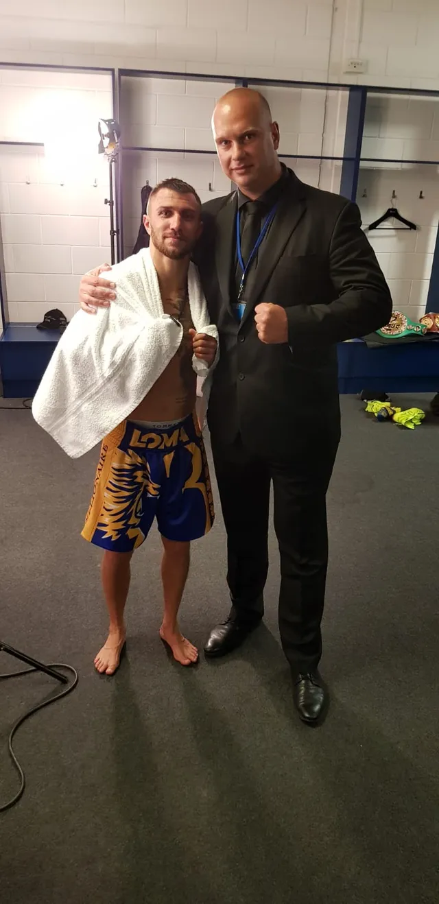 Event security officer with a boxer in a dressing room