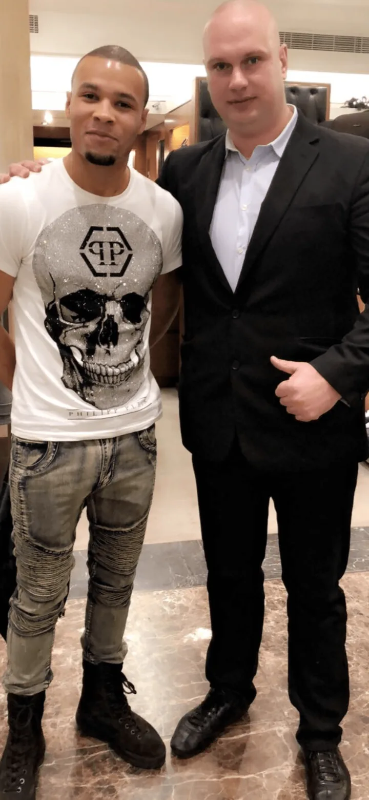 Security team member with a guest inside a retail store
