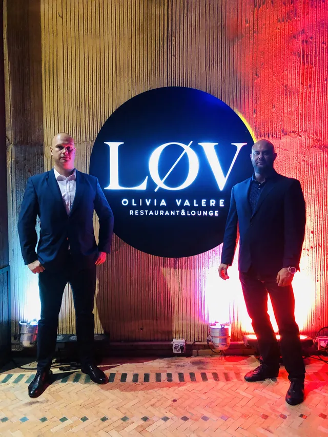 Two venue security officers at a restaurant and lounge